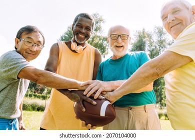 group of senior friends playing at the park. Lifestyle concepts about seniority and third age - Powered by Shutterstock