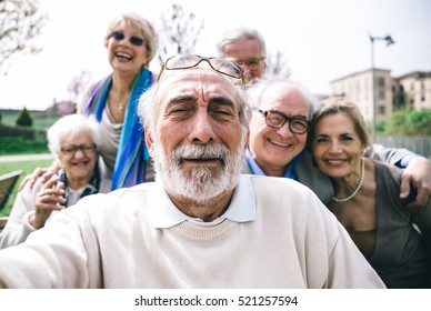 Group of senior looking in camera for a portrait - Powered by Shutterstock