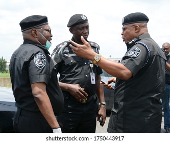 A Group Of Senior Nigerian Police Officers Having A Discussion, Lagos, Nigeria, April 7, 2020