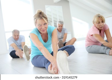 Group Of Senior People Doing Stretching Exercises