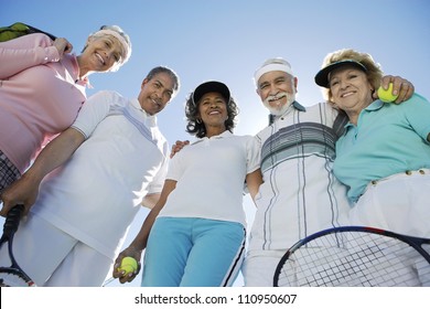 Group of senior tennis players against clear sky - Powered by Shutterstock