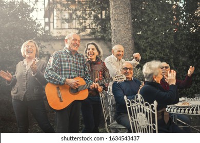 
Group Of Seniors Celebrating In The Garden