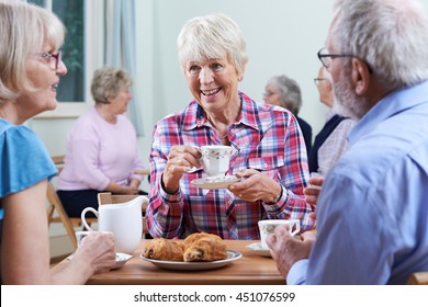 Group Of Seniors Meeting At Social Club