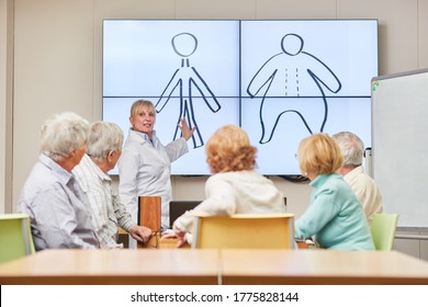 Group Of Seniors At Nutritional Counseling Seminar In An Adult Education Center