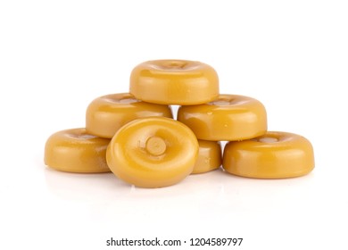 Group Of Seven Whole Hard Caramel Cream Candy Butterscotch Variety Isolated On White Background