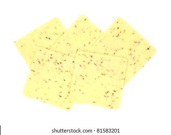 A Group Of Several Slices Of Pepper Jack Cheese On A White Background.