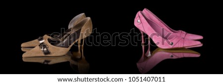 Group of shoes on black background, isolated product, comfortable footwear.