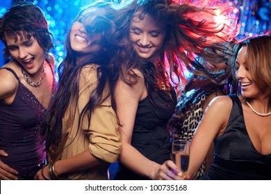 Group shot of young women celebrating their friend'??s forthcoming marriage, hen party