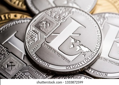 Group of silver litecoin coins, close-up. Cryptocurrency concept, e-banking.