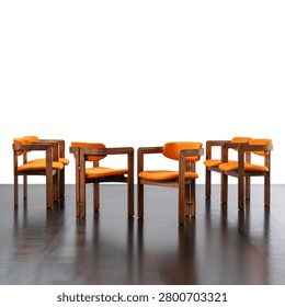 group of six chairs featuring a solid wood frame and fabric-covered seats.