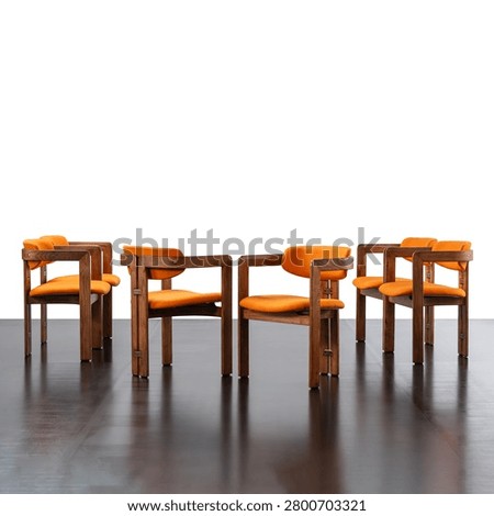 group of six chairs featuring a solid wood frame and fabric-covered seats.