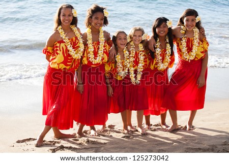 Group of six polynesian Hula girls  in Friendship looking at camera