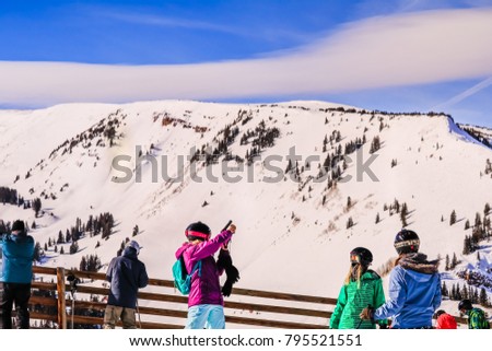 Similar – Skier from behind on the mountain