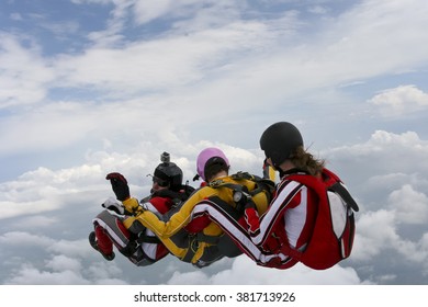 Group Of Skydivers In Freefall.