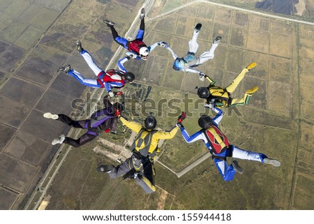 Group of skydivers in freefall.