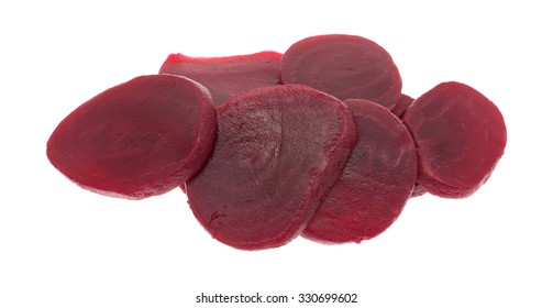 A Group Of Sliced Canned Beets Isolated On A White Background.