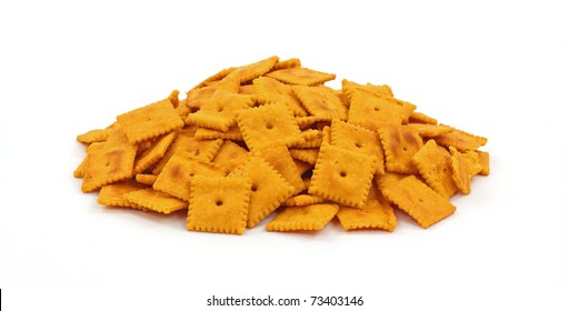 A Group Of Small Square Tasty Cheese Crackers.