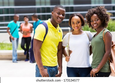group of smiling african american college friends outdoors