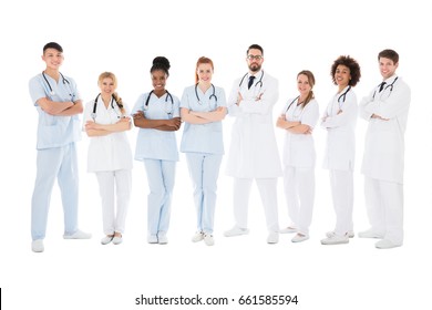 Group Of Smiling Doctors With Stethoscopes Over White Background