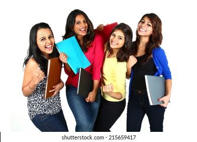 Group of smiling female friends/students, isolated on white background