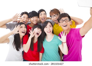 group of smiling friends with camera  taking self photo - Shutterstock ID 281101427