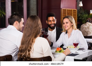 Group Smiling Friends Eating Restaurant Table Stock Photo 486118579 ...