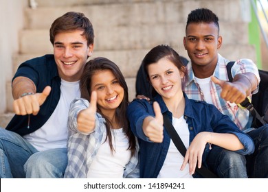 Group Smiling High School Students Giving Thumbs Up