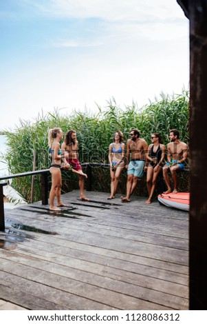 Similar – Image, Stock Photo Group of people in swimsuit having fun outdoors