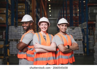 Group of smiling worker standing together at logistic distribution warehouse, Teamwork concept - Shutterstock ID 2060545658