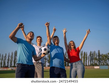 Group of soccer fans mixed age groups standing on field and chanting  - Powered by Shutterstock