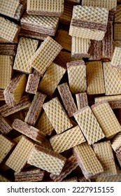 Group square wafer chocolate cream biscuits crispy small, wafer cookies filled with cream is a type of baked goods that have a waffle pattern, isolated on wSweet cookies. Small waffle cookieshite back - Shutterstock ID 2227915155