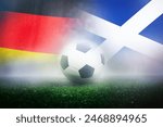 group A stage match , Germany vs Scotland , Football Nation Flag and soccer ball on green grass