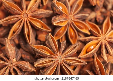 A group of star anises close up background. Dried star anise spice fruits top view - Powered by Shutterstock