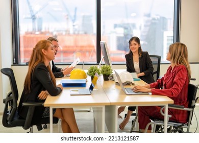 Group Of Startup Business Co-worker Working In Office With Disability Staff Sitting On Wheelchair As A Professional One Team Together