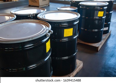 Group Of Steel Drums Storing Hazardous Waste In A Sheltered Accumulation Area