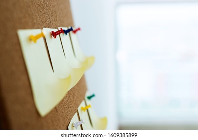 Group of sticky notes on wall office