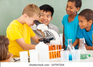 group of students in elementary science class with teacher