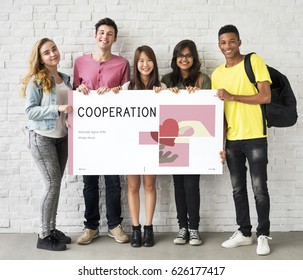 Group of students holding banner of charity donations campaign - Powered by Shutterstock