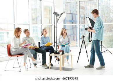 Group of students with instructor during photography classes