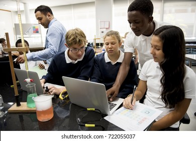 Group Of Students Laboratory Lab In Science Classroom