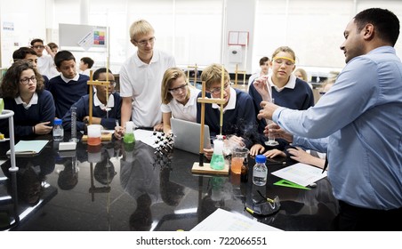 Group Of Students Laboratory Lab In Science Classroom