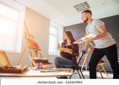 Group of students painting at art lessons. - Shutterstock ID 633363983