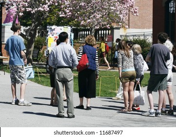 Group Of Students And Parents Taking College Tour