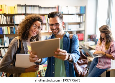 Group of students study at library. Learning and preparing for university exam. - Powered by Shutterstock