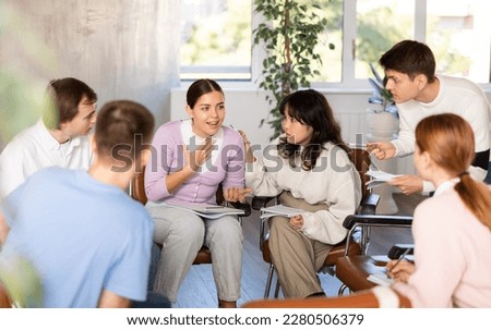 Group of students studying for difficult test in studygroup together