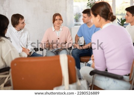 Group of students studying for difficult test in studygroup together