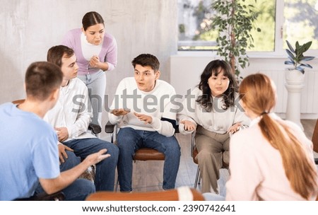 Group of students studying for difficult test in studygroup together