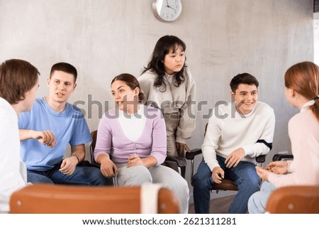 Group of students studying for difficult test in studygroup together