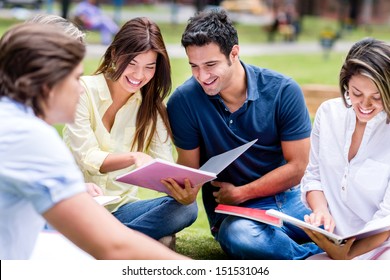 Group of students studying outdoors and looking very happy - Powered by Shutterstock