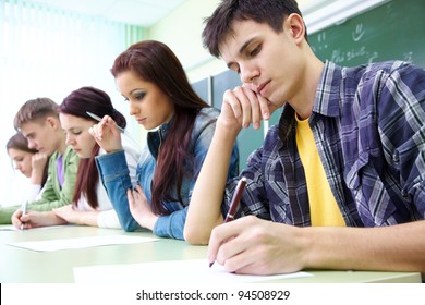 group of students takes the test in class